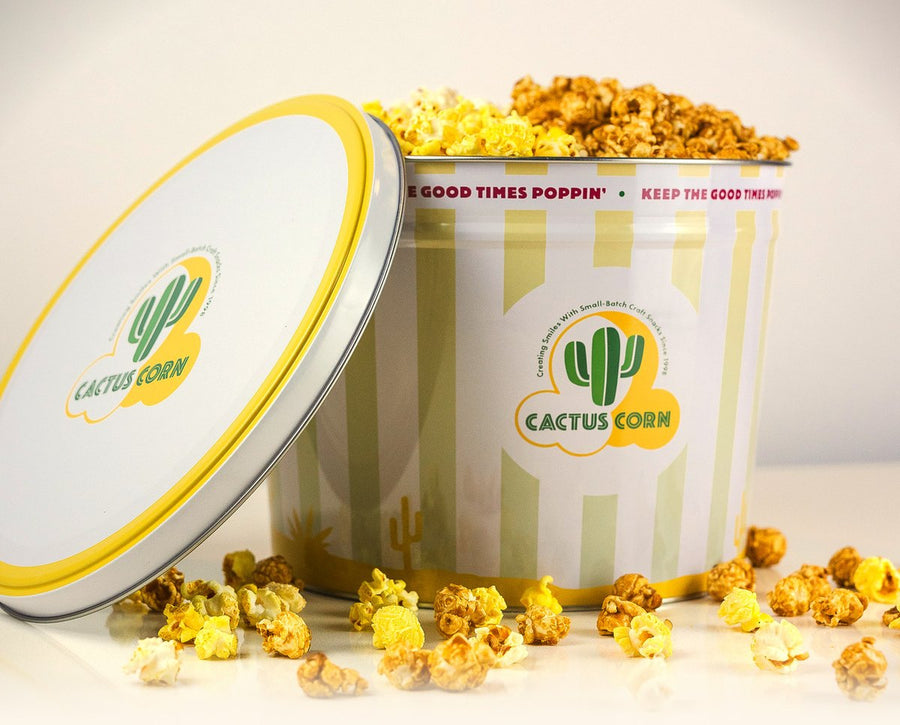 Cactus Corn one gallon Arizona popcorn tin, lid leaning against it, filled with caramel and kettle corn